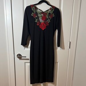 Chic Black Dress with Red Floral Accents